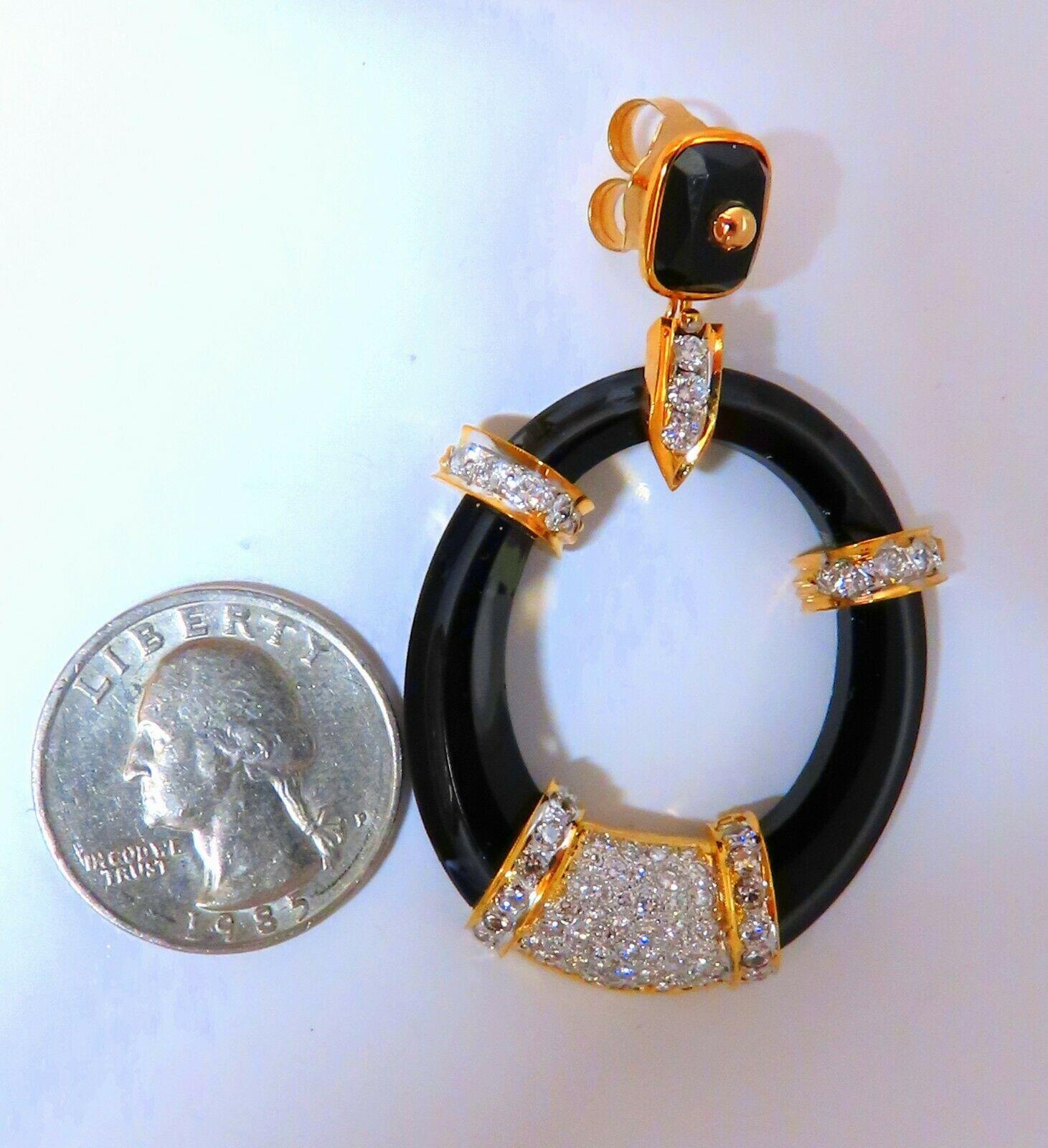 Retro Onyx Diamond Clip Earrings

Gothic Jet Black Carved Natural Onyx 

3.00ct Natural Round Cut Diamonds

G-color Vs-2 clarity.

14Kt. yellow gold.

28.6 Grams.

2.25 x 1.35 Inch 

Comfortable butterfly pushbacks

$12000 Appraisal will accompany