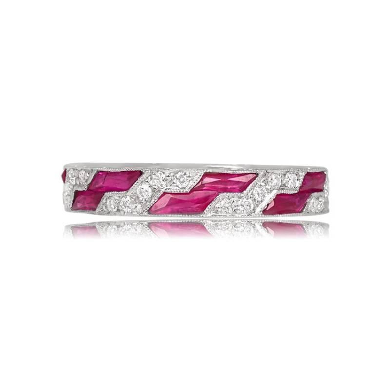 Crafted in platinum, the Ellamore band is a stunning Art Deco-inspired wedding band featuring alternating bands of French-cut natural rubies and round brilliant-cut diamonds. The approximate total weight of the diamonds is 0.30 carats, while the