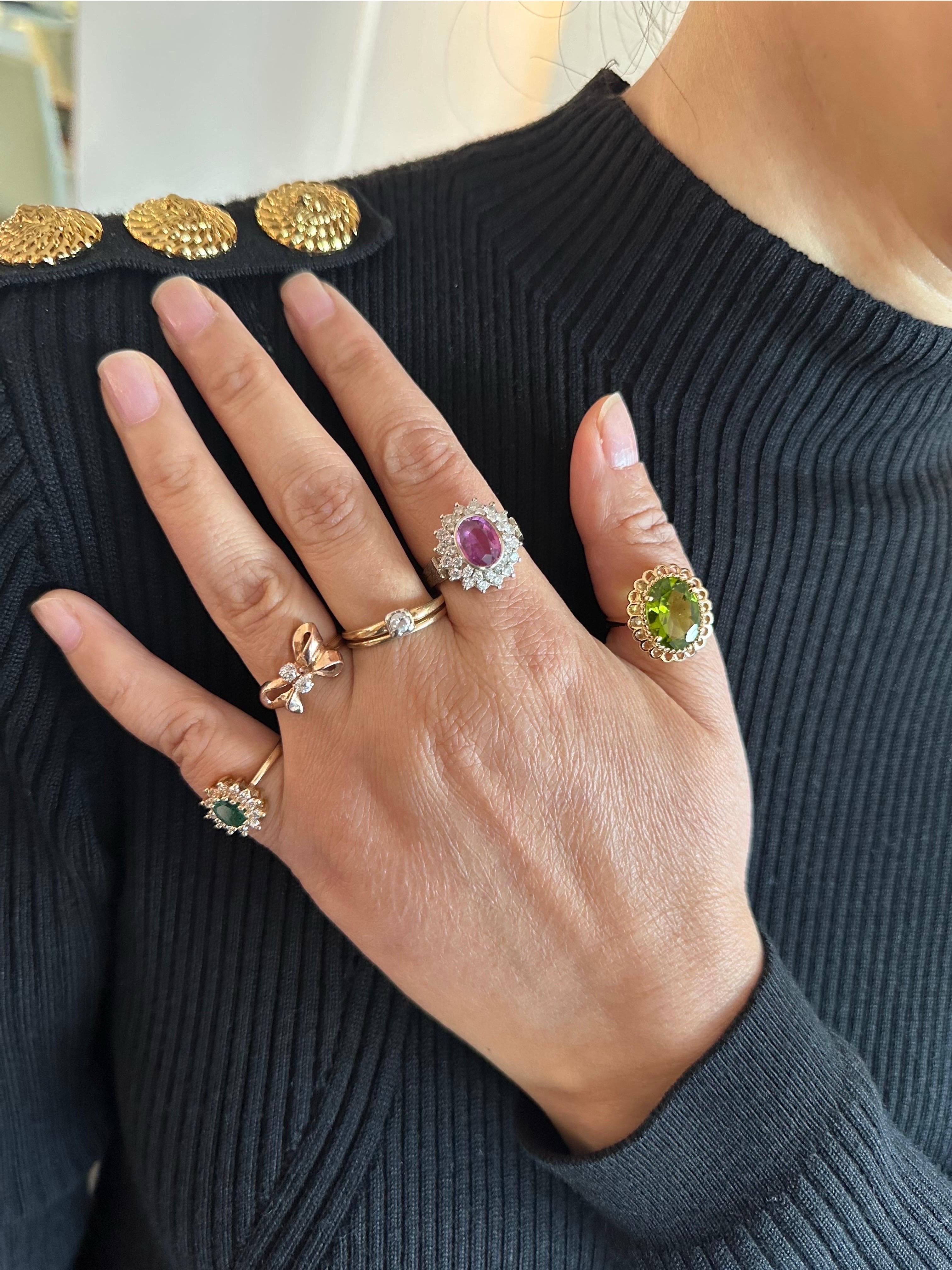 10K and 18K White Gold Ring Set with a Pink Saphire Center Stone and Natural Diamond Side Stones. 

Gold Purity: Ring head 10k and Band is 18k white gold 
Gold Weight: 8.60g
Gold Color: White gold
Center Stone Gem: Pink Sapphire
Weight: Approx.