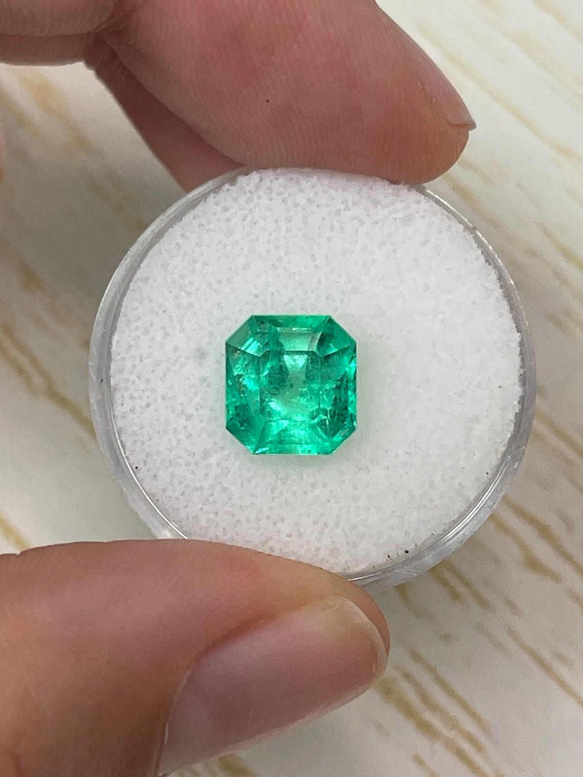 Stone: Emerald
Weight: 3.01-carats
Shape: Asscher Cut
Clarity: Transparent
Luster: Very Good
Color: Yellowish Green
Measurements: 9.09mm x 8.52mm x 6.51mm
Geographic Origin: Colombia
Treatment: Natural, Oiling

Comments: Due to their growth