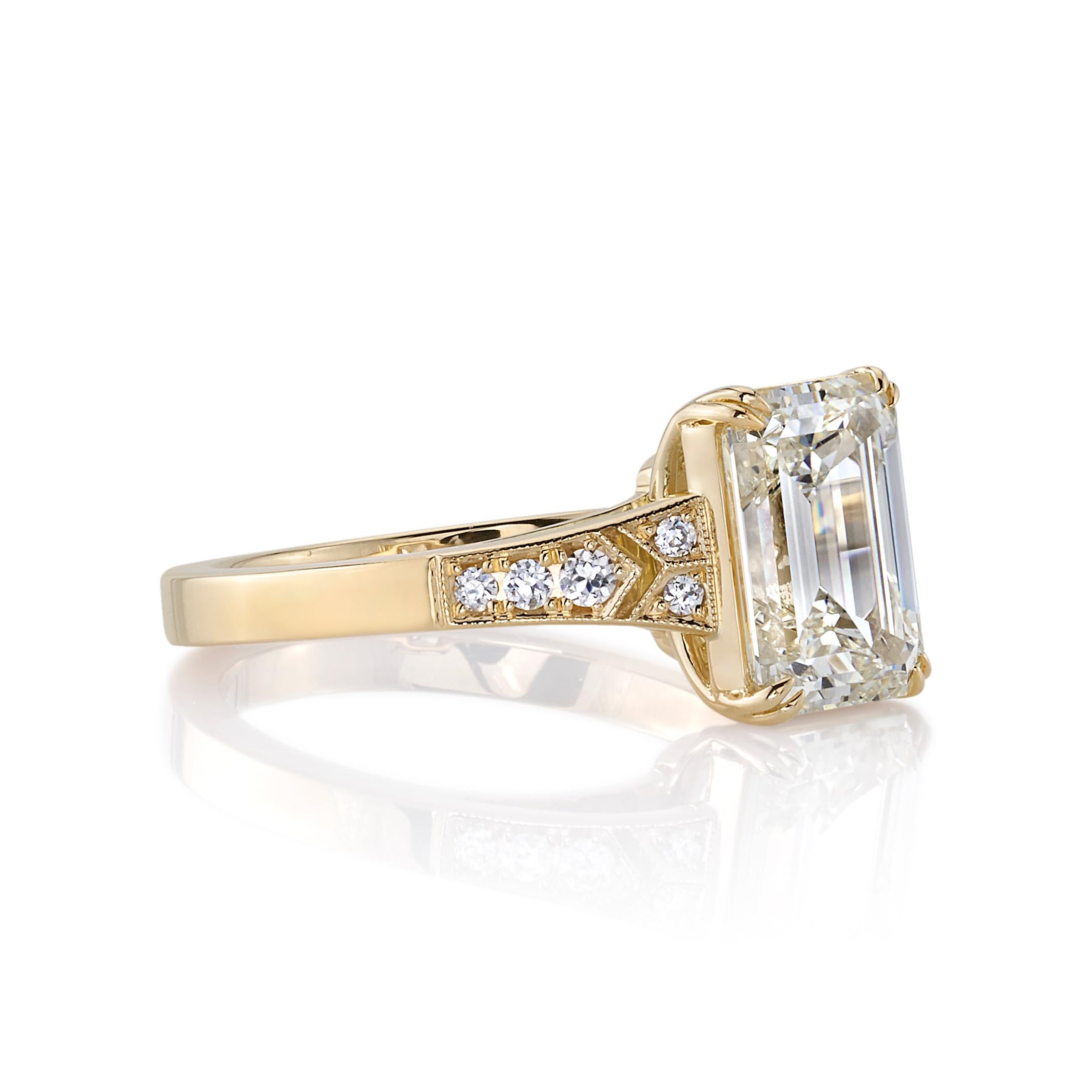 3.01ct U-V/VS1 GIA certified Emerald cut diamond with 0.10ctw old European cut accent diamonds set in a handcrafted 18K yellow gold mounting.

Ring is currently a size 6 and can be sized to fit. 

Our jewelry is made locally in Los Angeles and most