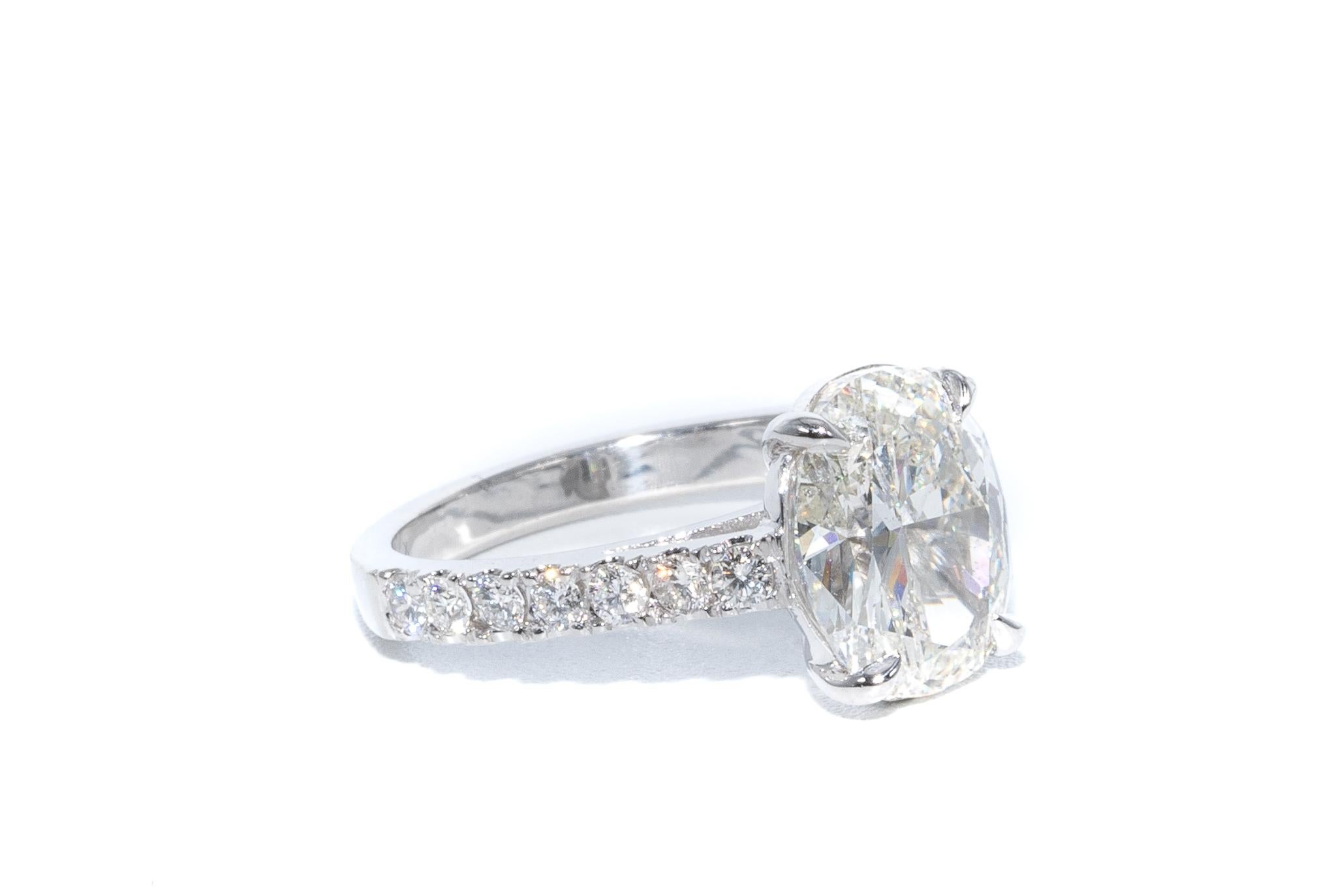 A 3.01 Oval Cut Diamond engagement ring in 18K White Gold. 
Accompanying GIA Grading report number 2193561594, stating diamond is J Color and SI1 in clarity.  Diamond is enhanced by 


Ring Size: 6- can be expertly re-sized at no charge
