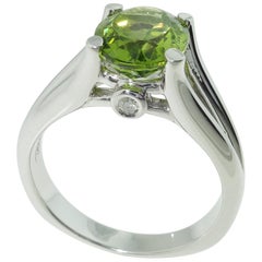 Solitärring mit 3,01 Karat Peridot und Diamant