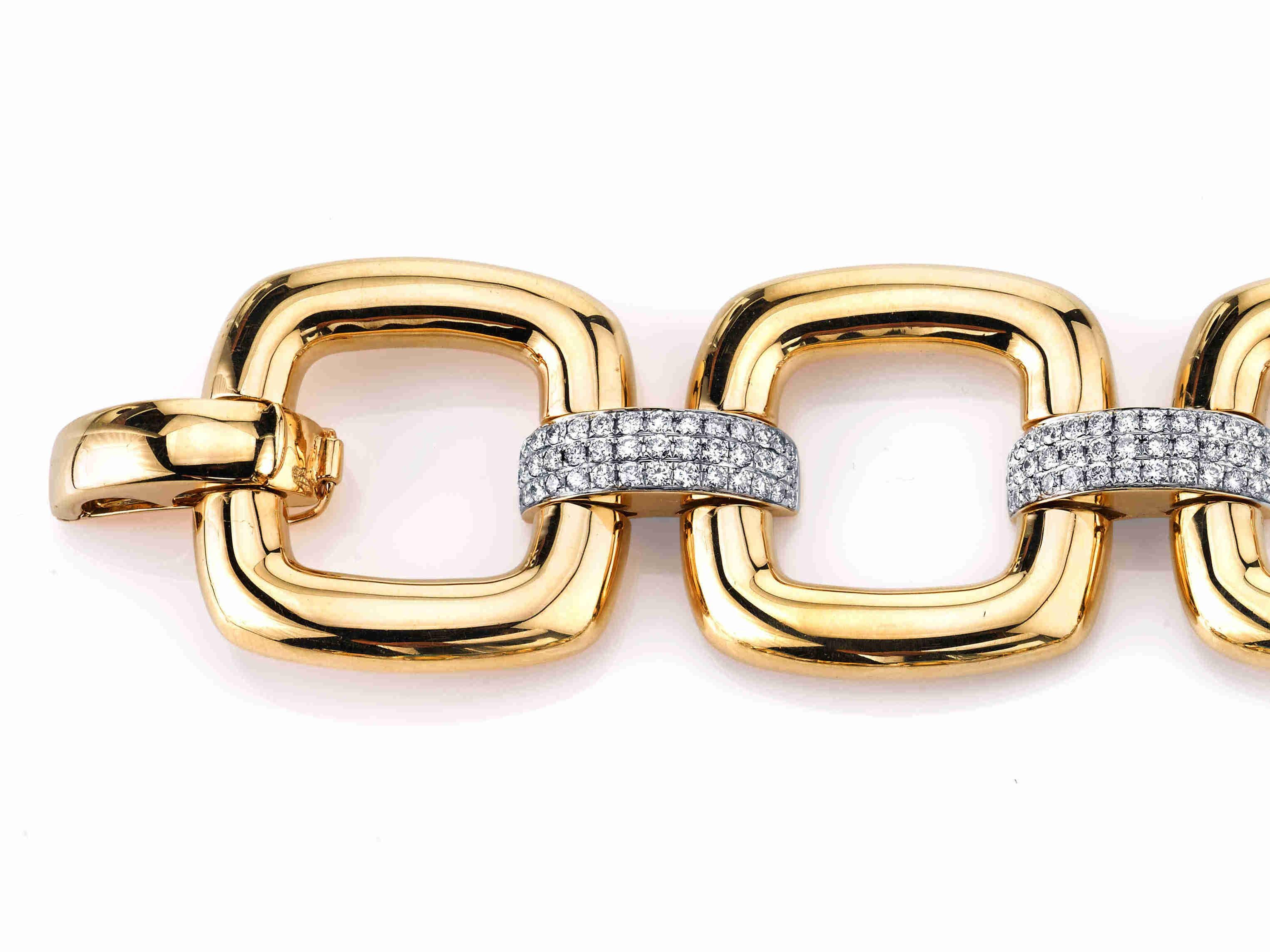 This bold yellow gold and diamond-set link bracelet has a modern retro-chic vibe. It is a statement piece that won't go unnoticed and it easily transitions from day wear to evening attire. The oversized 18k high-polished links are eye-catching by