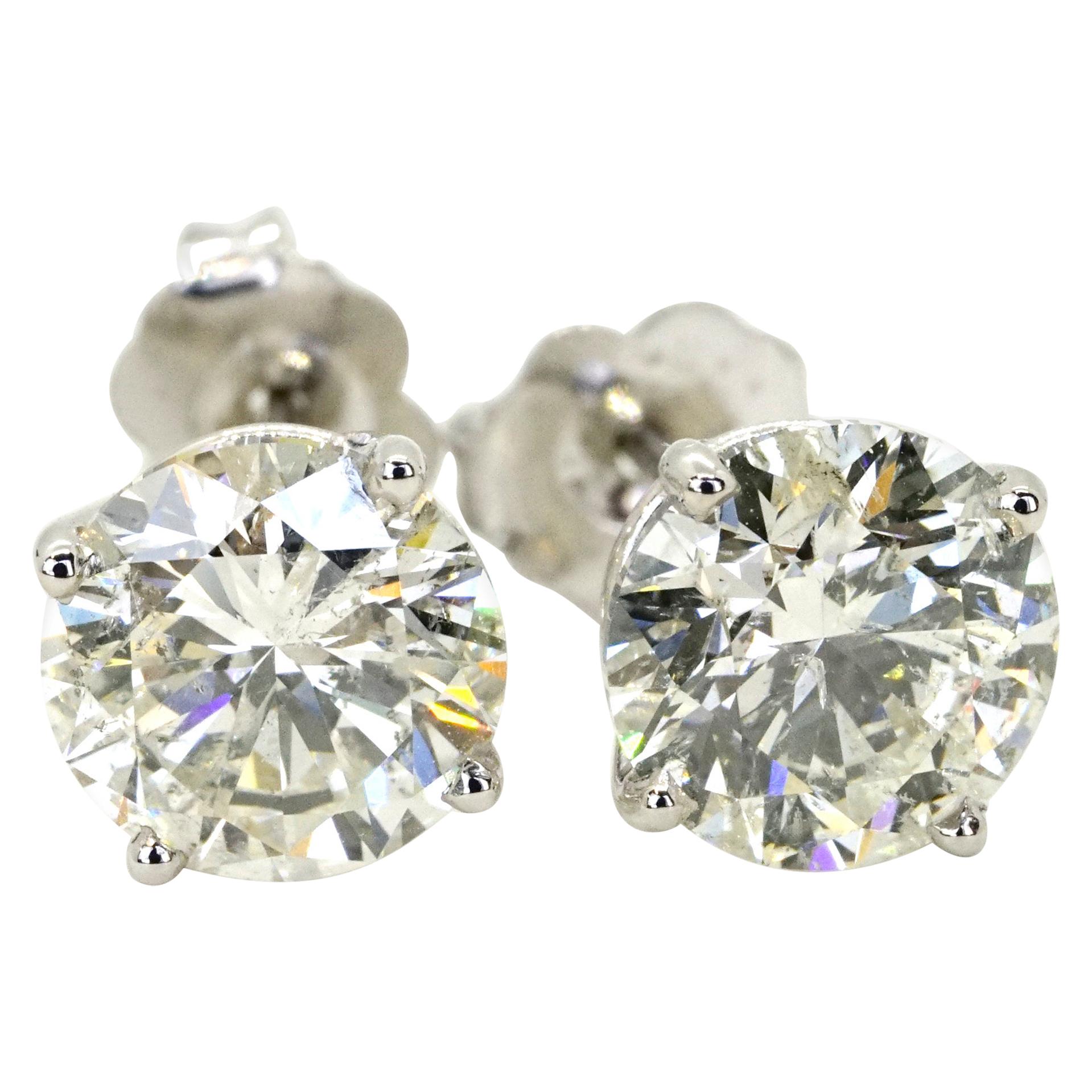 Clous d'oreilles en or blanc avec diamants de 3,01 carats au total