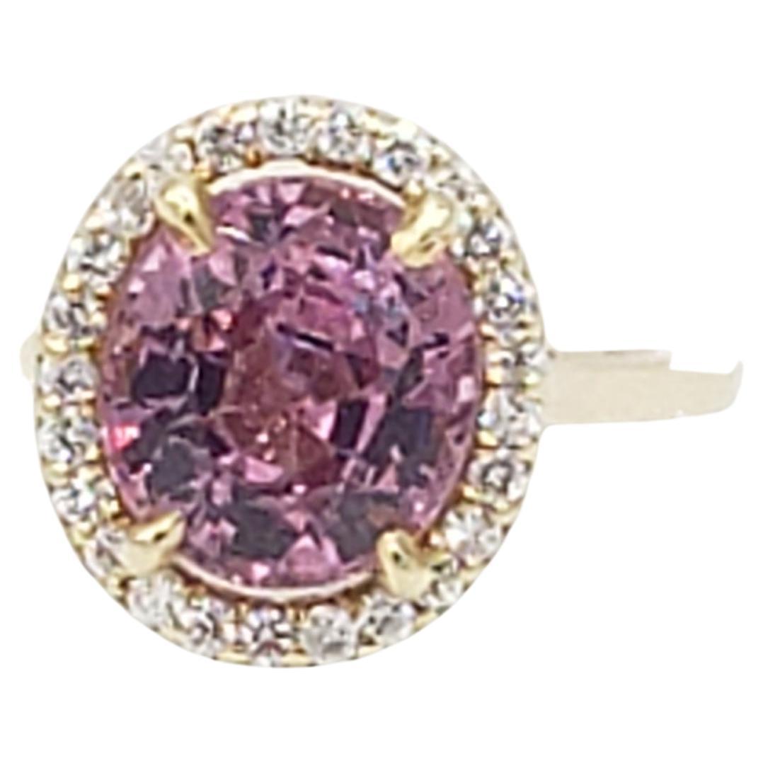 This exquisite 14k yellow gold ring from LaFrancee features a stunning 3.01 carat PERFECTLY CLEAN oval-shaped natural UNHEATED hot pink spinel, complemented by sparkling diamonds. The diamonds are F/VS  ideal cut hearts and arrows. The gem is