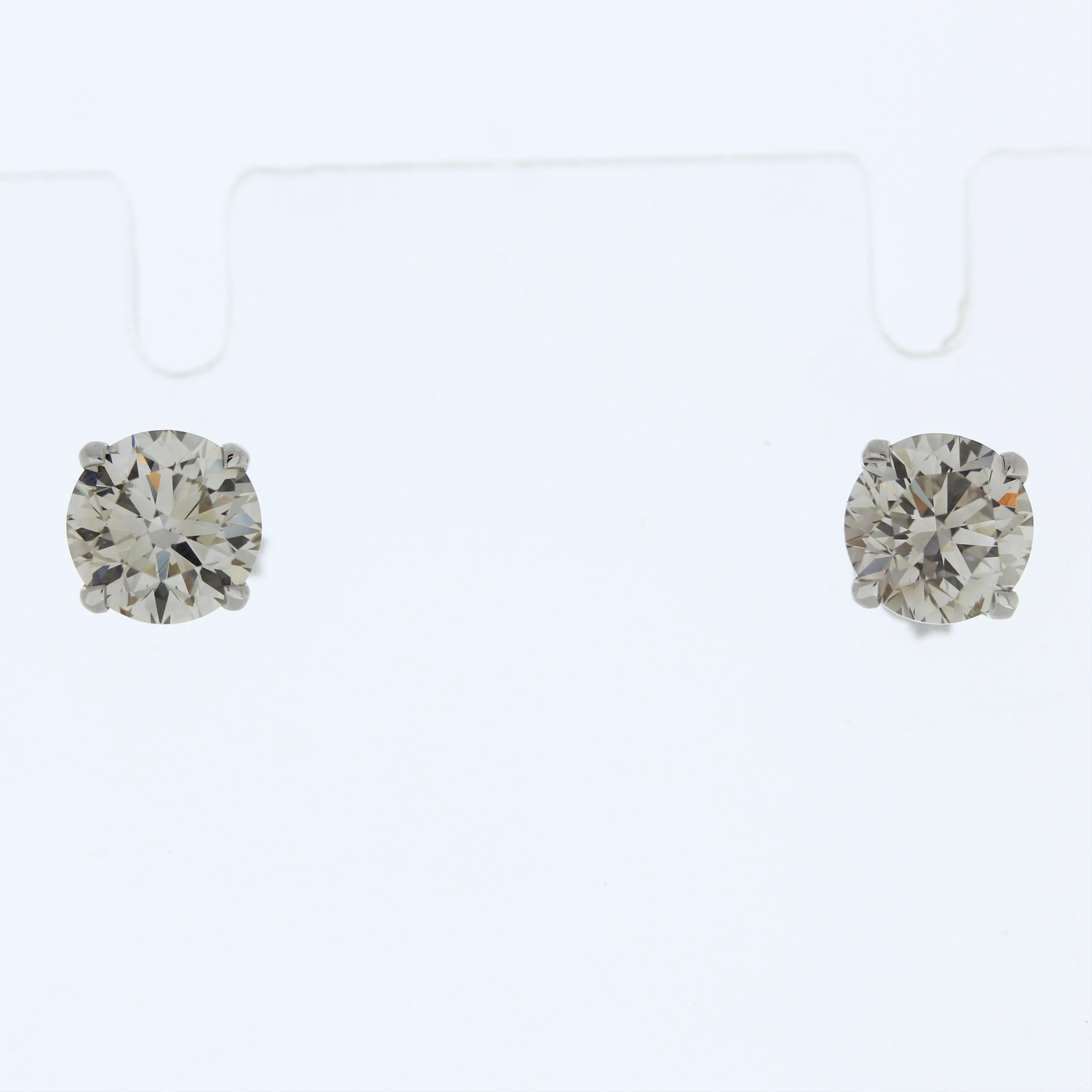 Contemporary 3.01 Total Carat Weight EGL Certified Round Diamond Studs In 14k White Gold For Sale