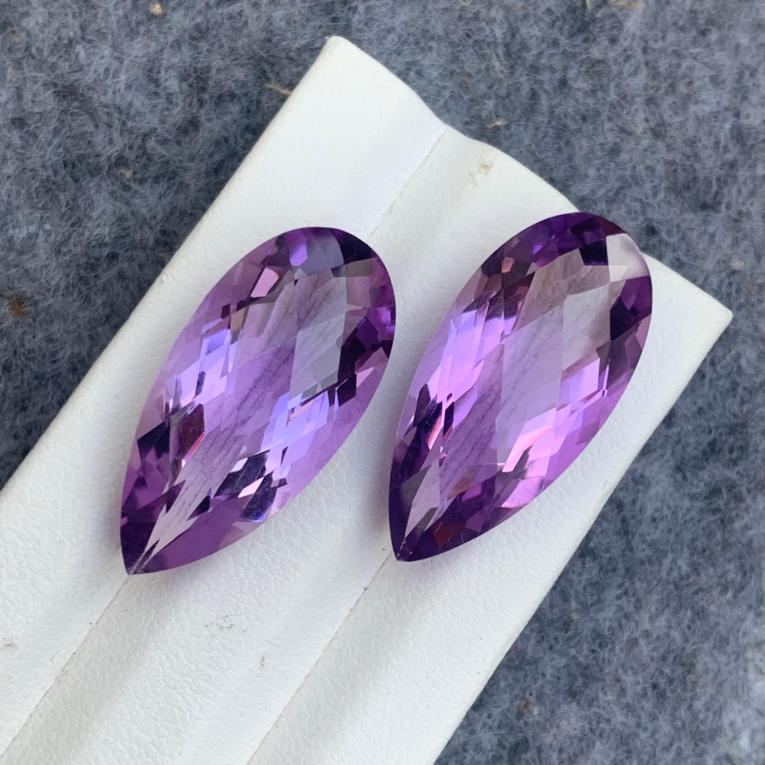 Gemstone Type : Amethyst
Weight : 30.10 Carats
Dimensions : 27x12.2x8.8 mm , 27x12.2x9.1 Mm
Clarity : Eye Clean
Origin : Brazil
Color: Purple
Shape: Pear 
Certificate: On Demand
Month: February
.

Purported amethyst powers for healing
enhancing the