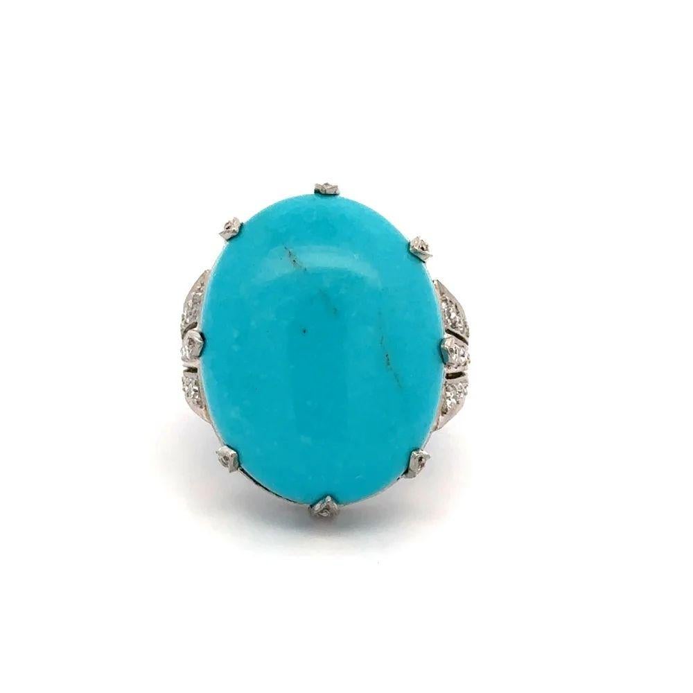 Simply Beautiful! Elegant and finely detailed Oval Sleeping Beauty Turquoise and OEC Diamond Platinum Statement Cocktail Ring. Centering a securely nestled Hand set Oval Sleeping Beauty Turquoise, weighing approx. 30.12 Carat, accented by Old