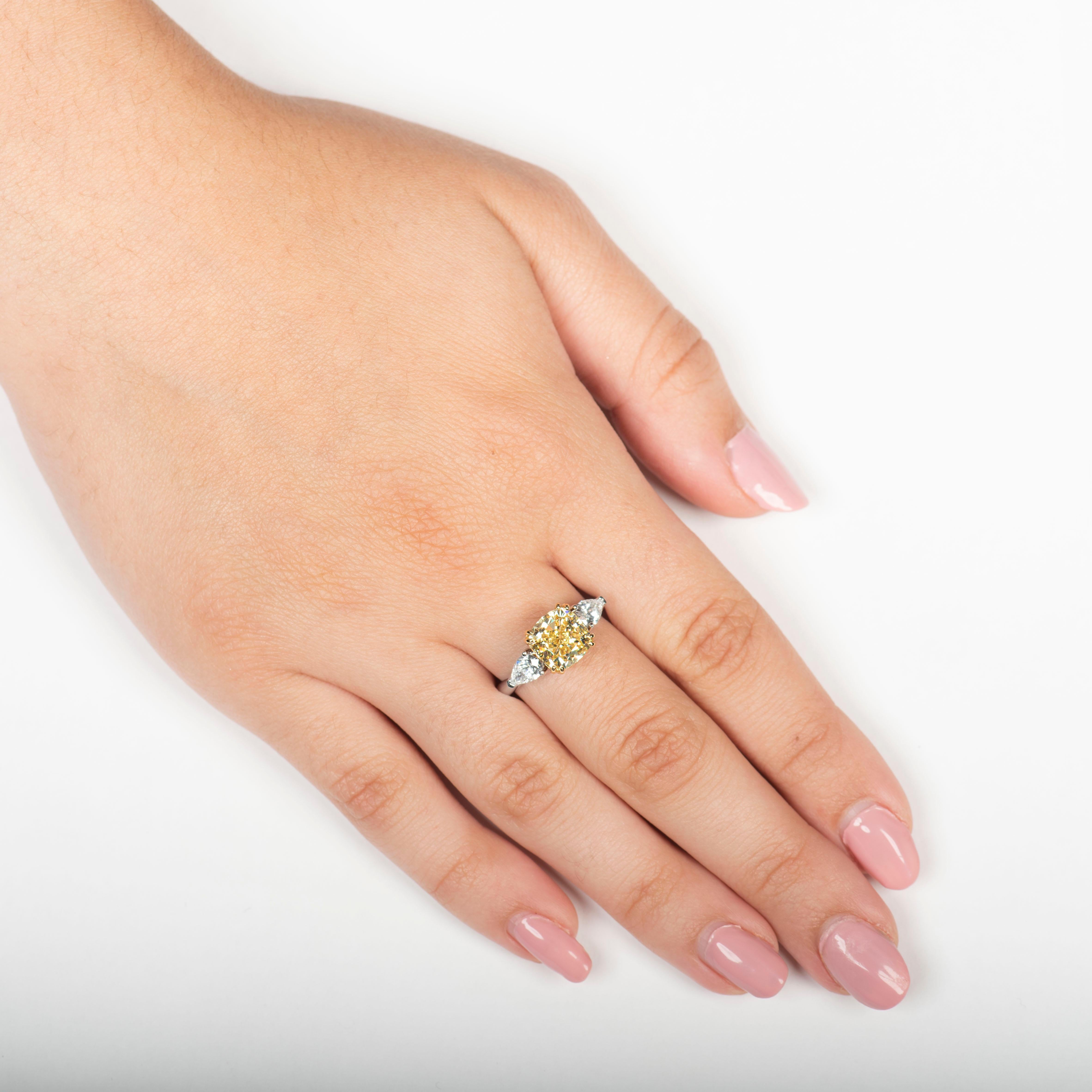 elongated cushion cut with pear side stones
