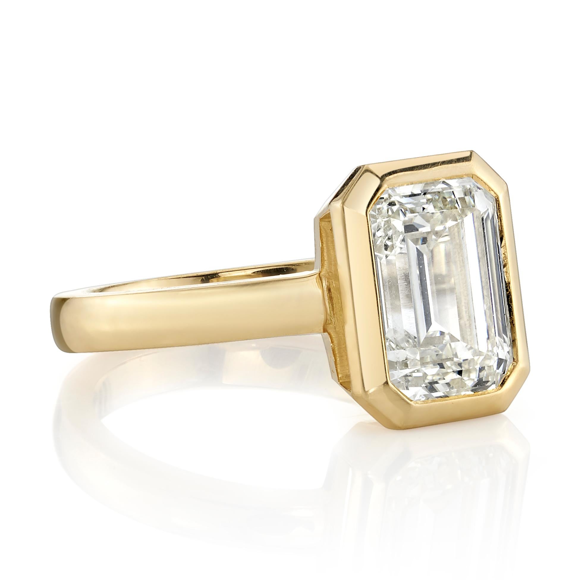 3.01ct N/VS1 GIA certified Emerald cut diamond set in a handcrafted 18K yellow gold mounting. Ring is currently a size 6 and can be sized to fi