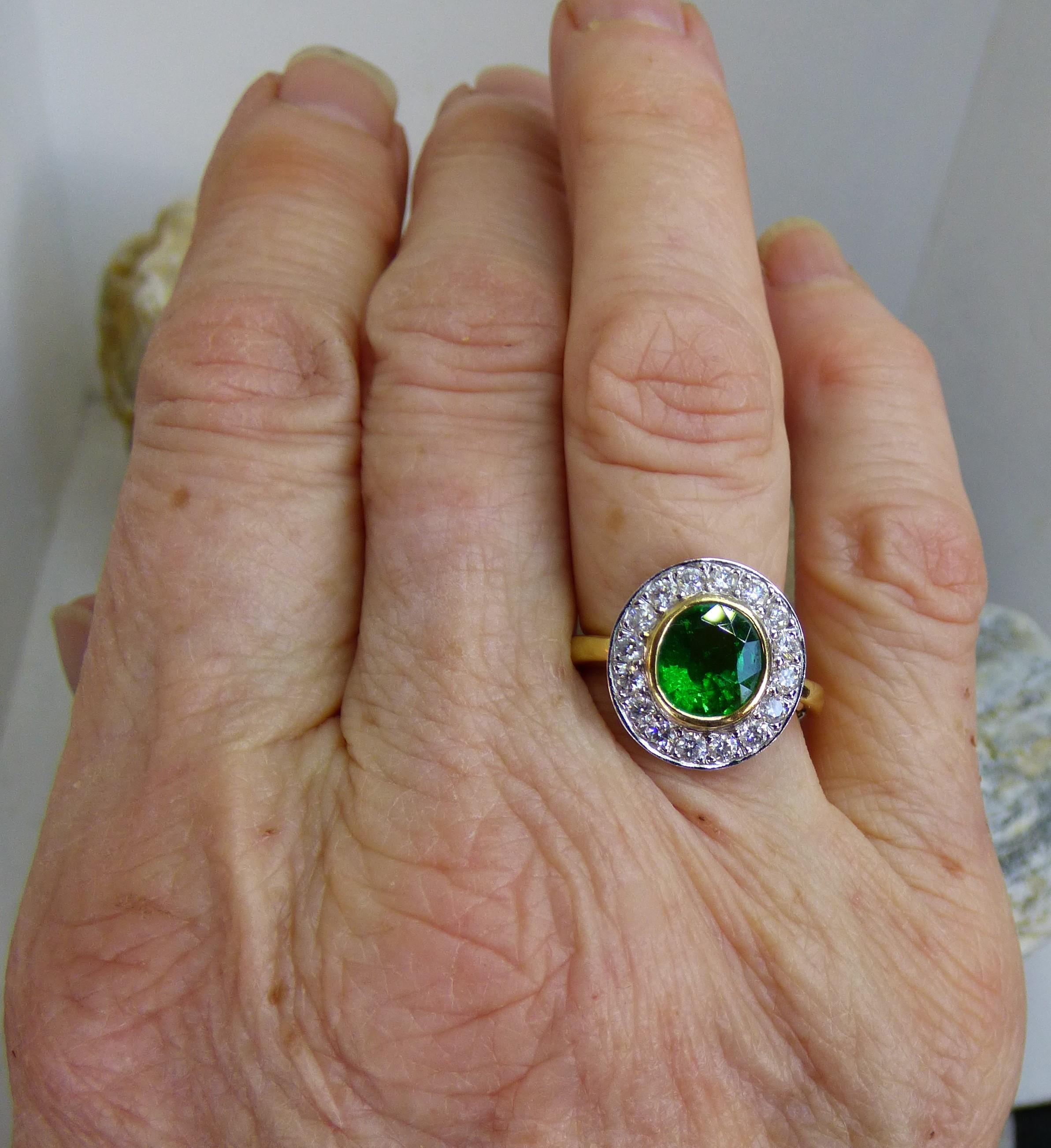3.01ct Oval Tsavorite Garnet and Diamond Cluster Ring in 18K gold For Sale 3