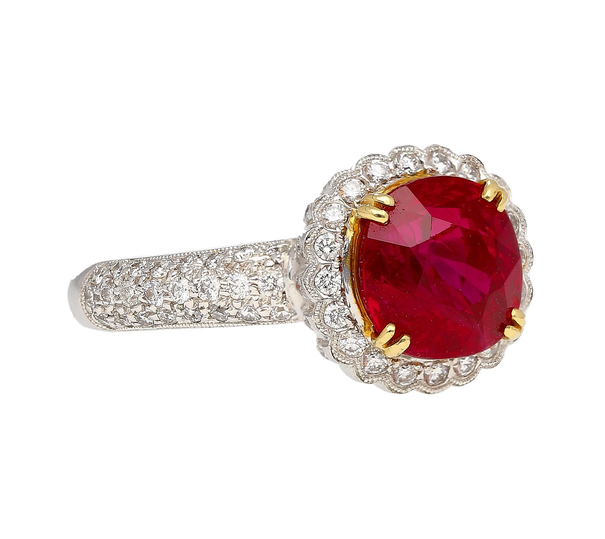 3.02 carat cushion cut Ruby and round diamond ring. The 3-carat center stone is certified by Gubelin Gem Lab to be natural, transparent, of Burmese origin, and have traditional heat treatment. The shank is set in platinum 900 and the 6 prongs are 18