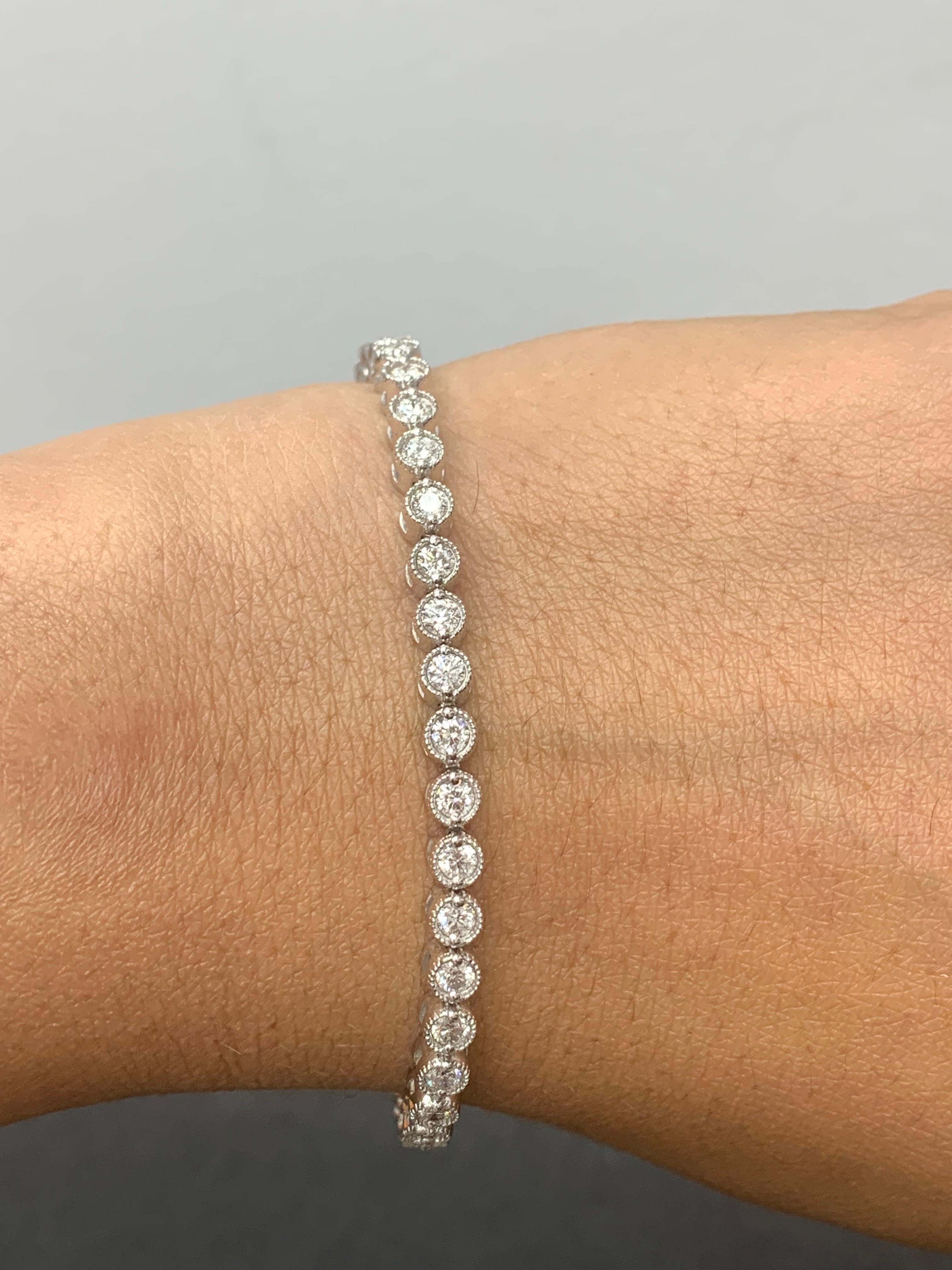 A versatile and timeless tennis bracelet showcasing a row of round brilliant diamonds weighing 3.02 carats total, set in 14k white gold. 

All diamonds are GH color SI1 Clarity.
Available in Yellow and Rose as well.
Style available in different