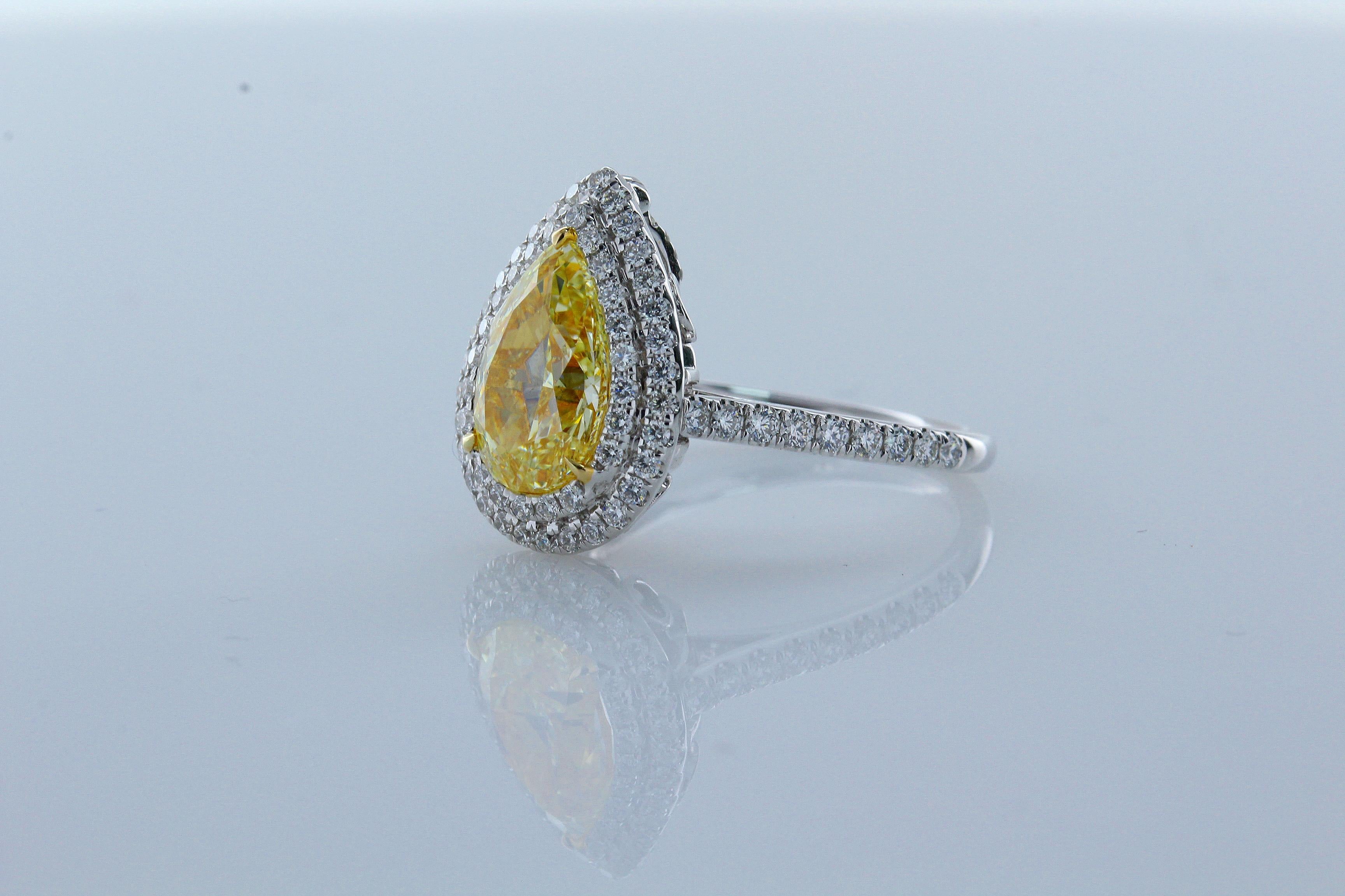 Contemporary 3.02 Carat Fancy Yellow Pear Shape SI1 Diamond Ring and Pendant 18 Karat For Sale