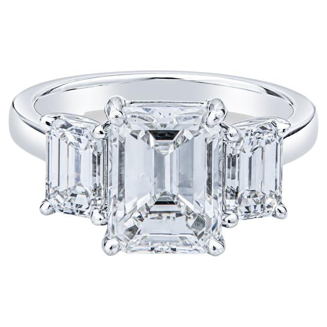 3.02 Carat GIA Certified Diamond Emerald Cut Three Stone Engagement Ring For Sale