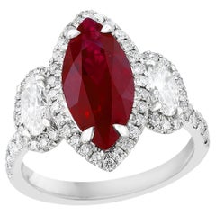 3.02 Carat Marquise Shape Ruby and Diamond 3 Stone Halo Ring in Platinum