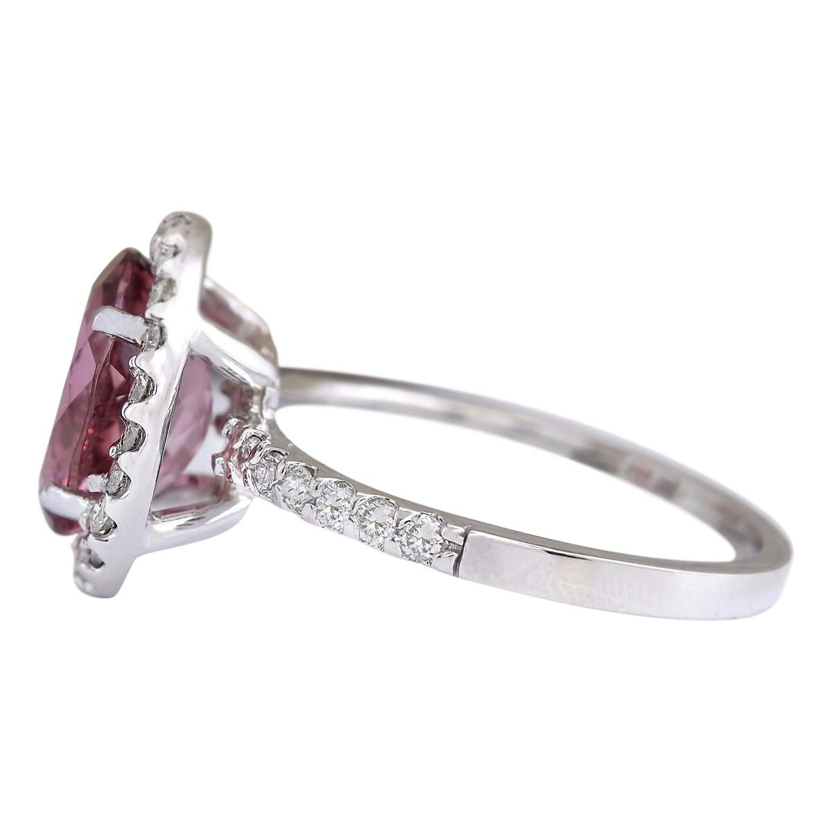 Stamped: 14K White Gold
Total Ring Weight: 3.2 Grams
Total Natural Tourmaline Weight is 2.42 Carat (Measures: 10.00x8.00 mm)
Color: Pink
Total Natural Diamond Weight is 0.60 Carat
Color: F-G, Clarity: VS2-SI1
Face Measures: 13.60x11.50 mm
Sku: