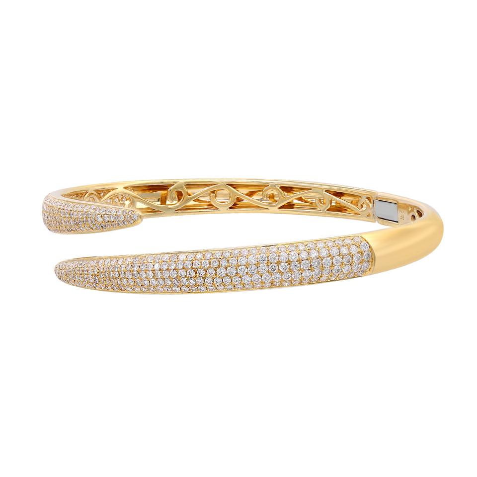 Introducing our 3.02 Carat Pave Set Round Cut Diamond Bangle Bracelet in 18K Yellow Gold. Immerse yourself in the allure of this exquisite piece. The bracelet boasts a stunning arrangement of round-cut diamonds, meticulously set in a captivating