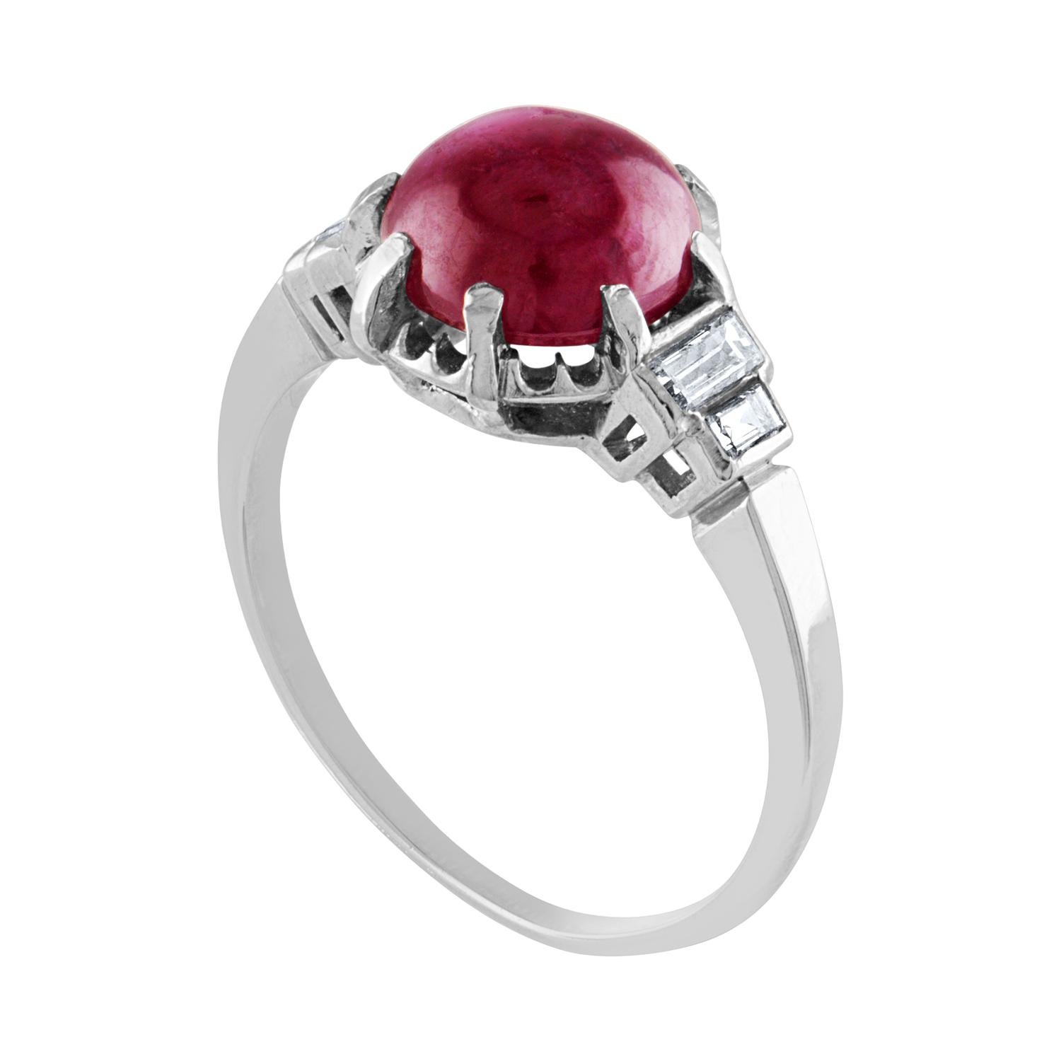 Cabochon Diamond Ring
The ring is Platinum.
The Cabochon Ruby is a 3.02 Carats
There are 0.20 Carats in Diamonds G/H VS
The ring is a size 5.5, sizable.
The ring weighs 3.8 grams