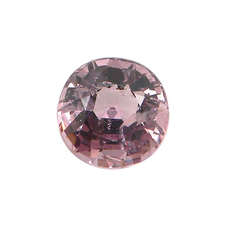 3.02 Carat Unheated Round-Cut Burmese Pink-Purple Spinel:

A beautiful gem, it is a 3.02 carat unheated round-cut Burmese pink-purple spinel. Hailing from the historic Mogok mines in Burma, the spinel possesses a pastel pink-purple colour