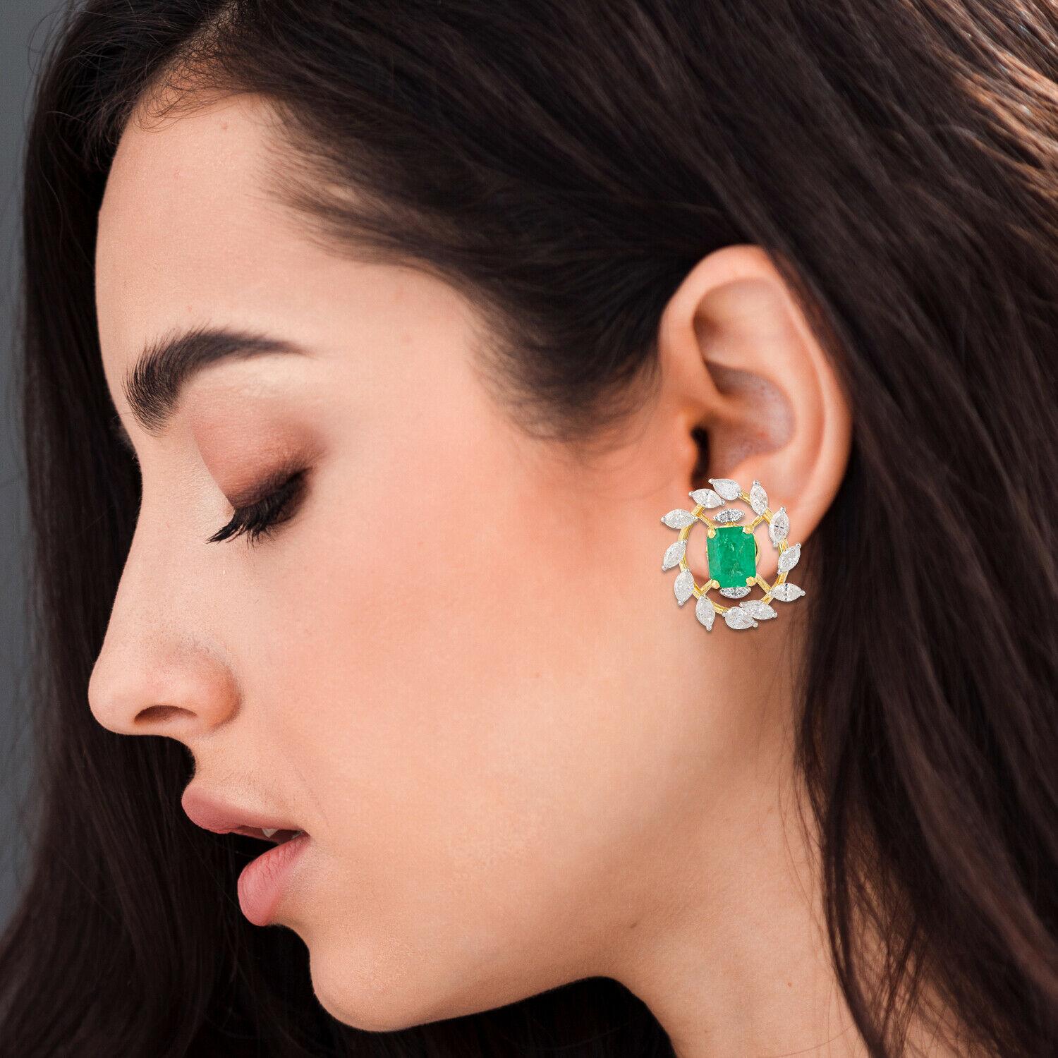 Cast in 14 karat gold, these stunning stud earrings are hand set with 3.02 carats emerald and 2.70 carats of glimmering diamonds. Available in white and yellow gold. See matching ring that compliments with these earrings.

FOLLOW MEGHNA JEWELS
