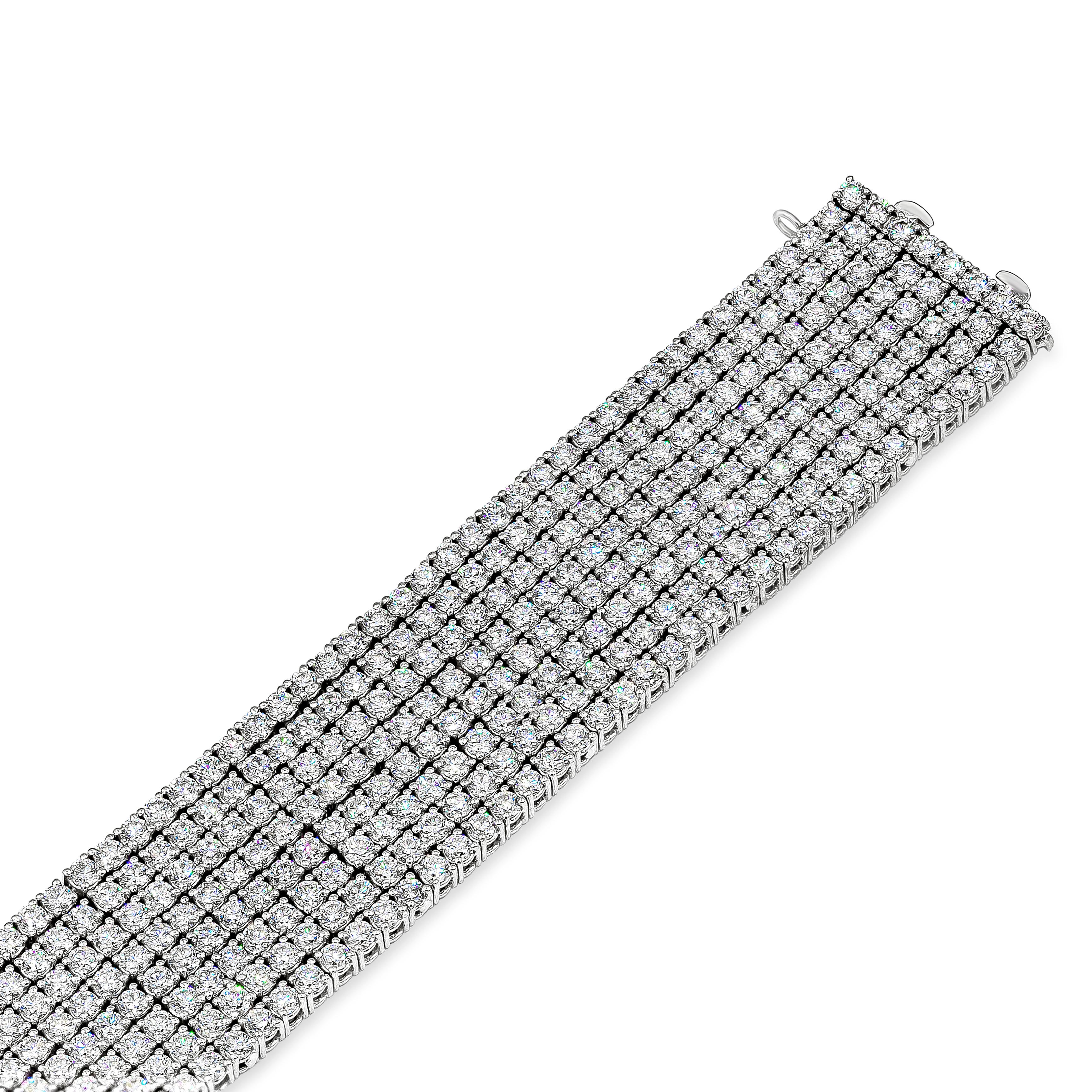 A classic and important tennis bracelet featuring eight rows of round brilliant diamonds weighing 30.20 carats total, G Color and VS-SI in Clarity. Double lock mechanism for maximum security and safety. Made with 18K White Gold, 7.02 inches in