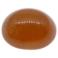 Garnet spessartine orange cabochon ovale de 30.28 carats du Nigeria