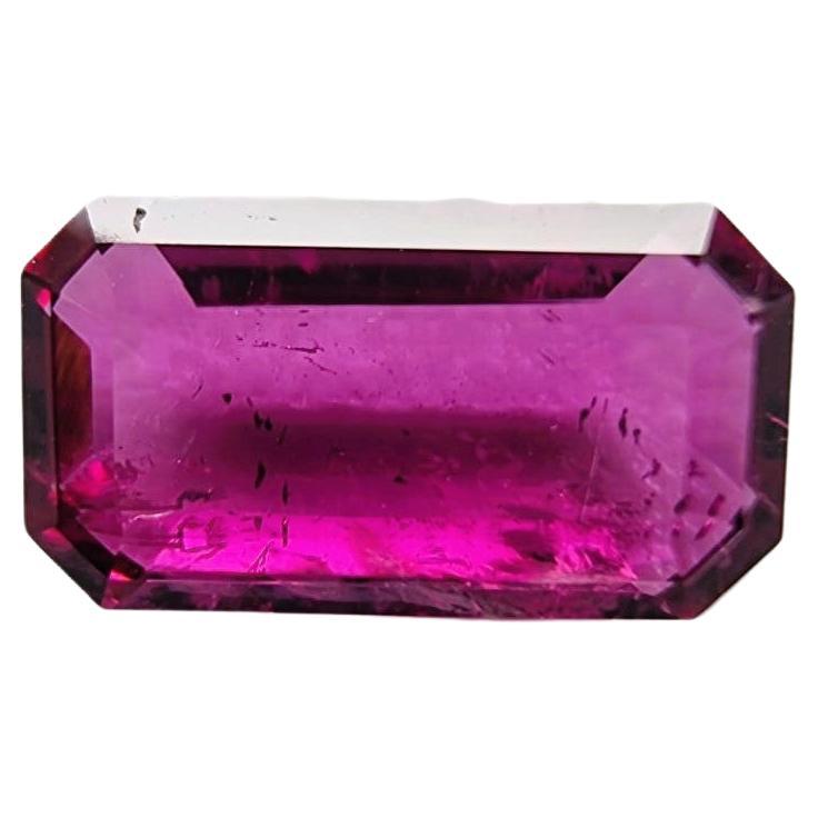 Begin your distinguished custom design with this unique 3.02ct Emerald Cut Red Rubellite Tourmaline Loose Gemstone. 

Gemstone Details:
Carat Weight: 3.02 carats
Shape: Custom Emerald Cut
Variety: Red Rubellite Tourmaline

Measurements:
Length: