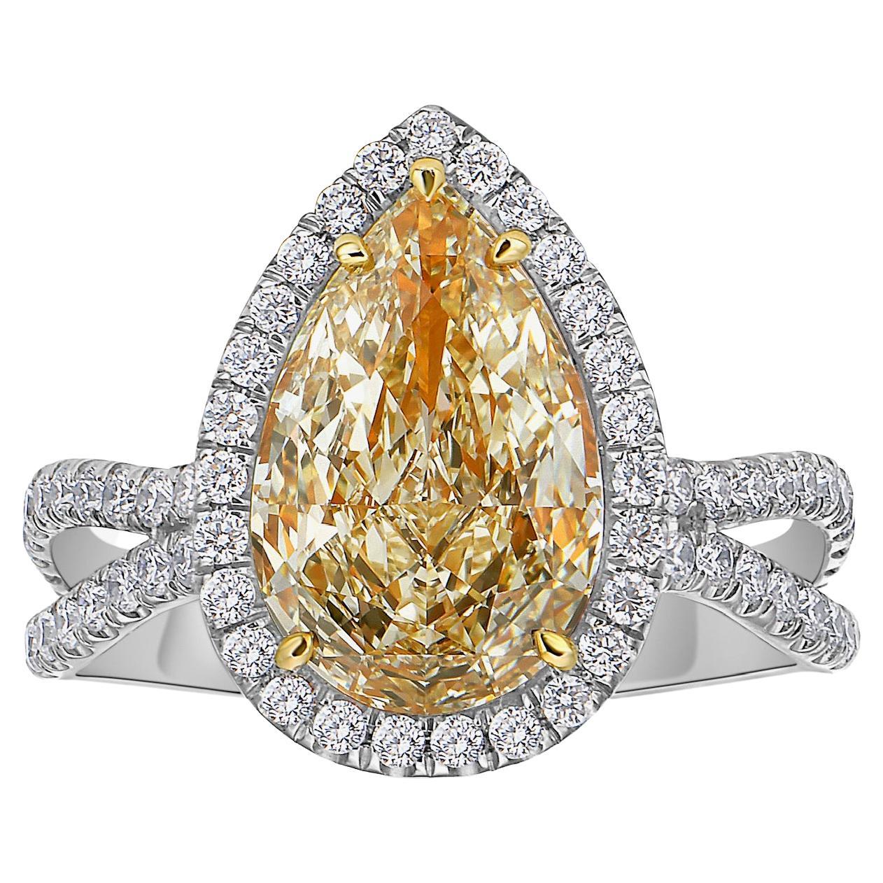 3 Carat VS1 Light Yellow Pear Halo Diamond Ring For Sale