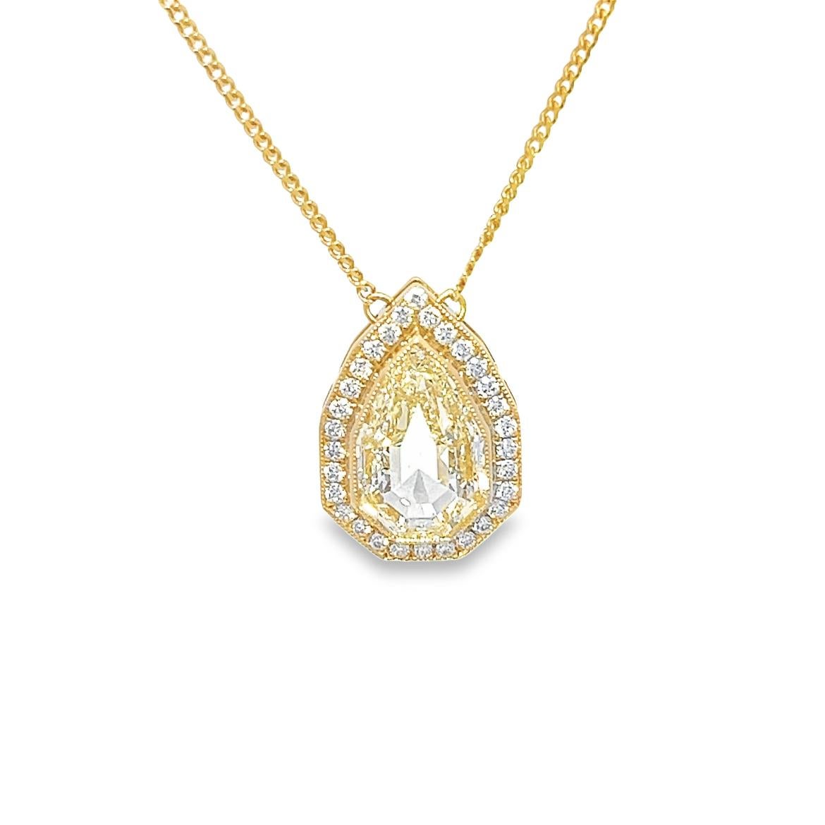 one-of-a-kind natural 3.02CT Modified PeIntroducing a one-of-a-kind 3.02CT Modified Pear Step Cut Yellow Art Deco Pendant that is sure to make a statement. This stunning piece features a GIA-certified #6227082258 M color diamond with crystal,