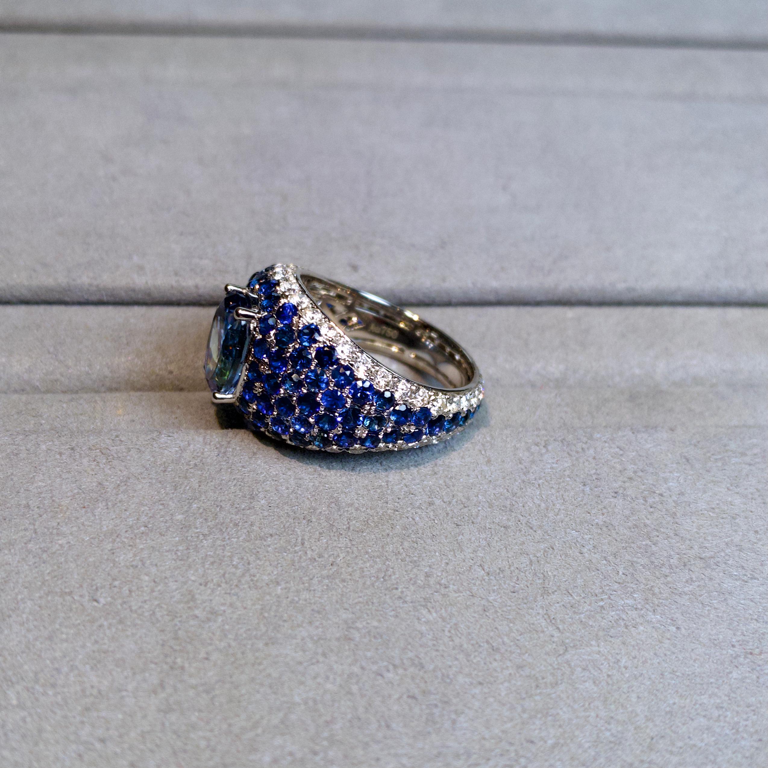 Contemporary Eostre Tanzanite , Blue Sapphire And Diamond Ring in 18K White Gold For Sale