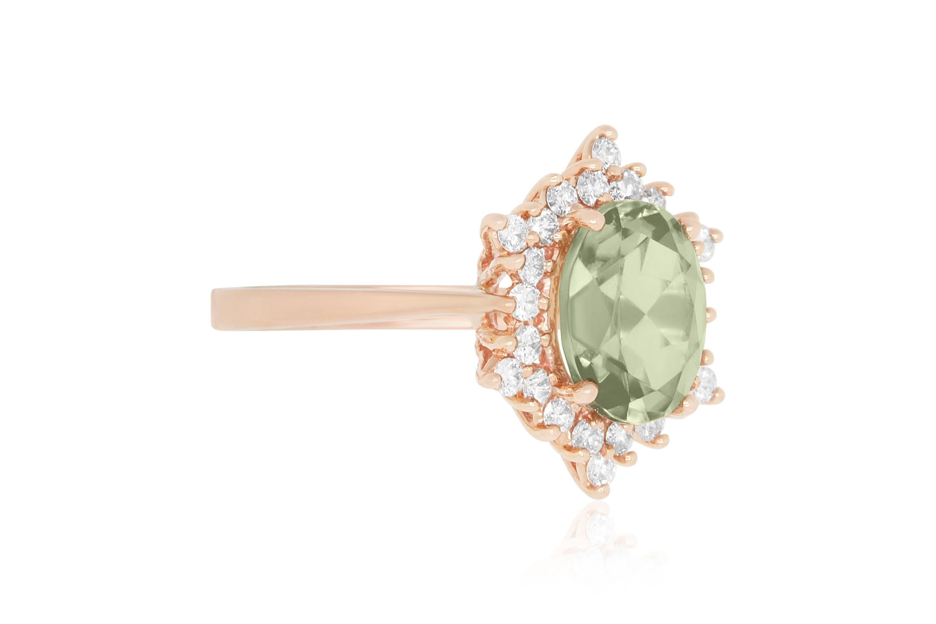 This fabulous ring features 3.03 Carat Oval Shaped Color Change Diaspore with 24 round White Diamonds of SI clarity, all set in 14K Rose Gold. This new gemstone was discovered and mined in Turkey’s Anatolian Mountains. Under natural light, it