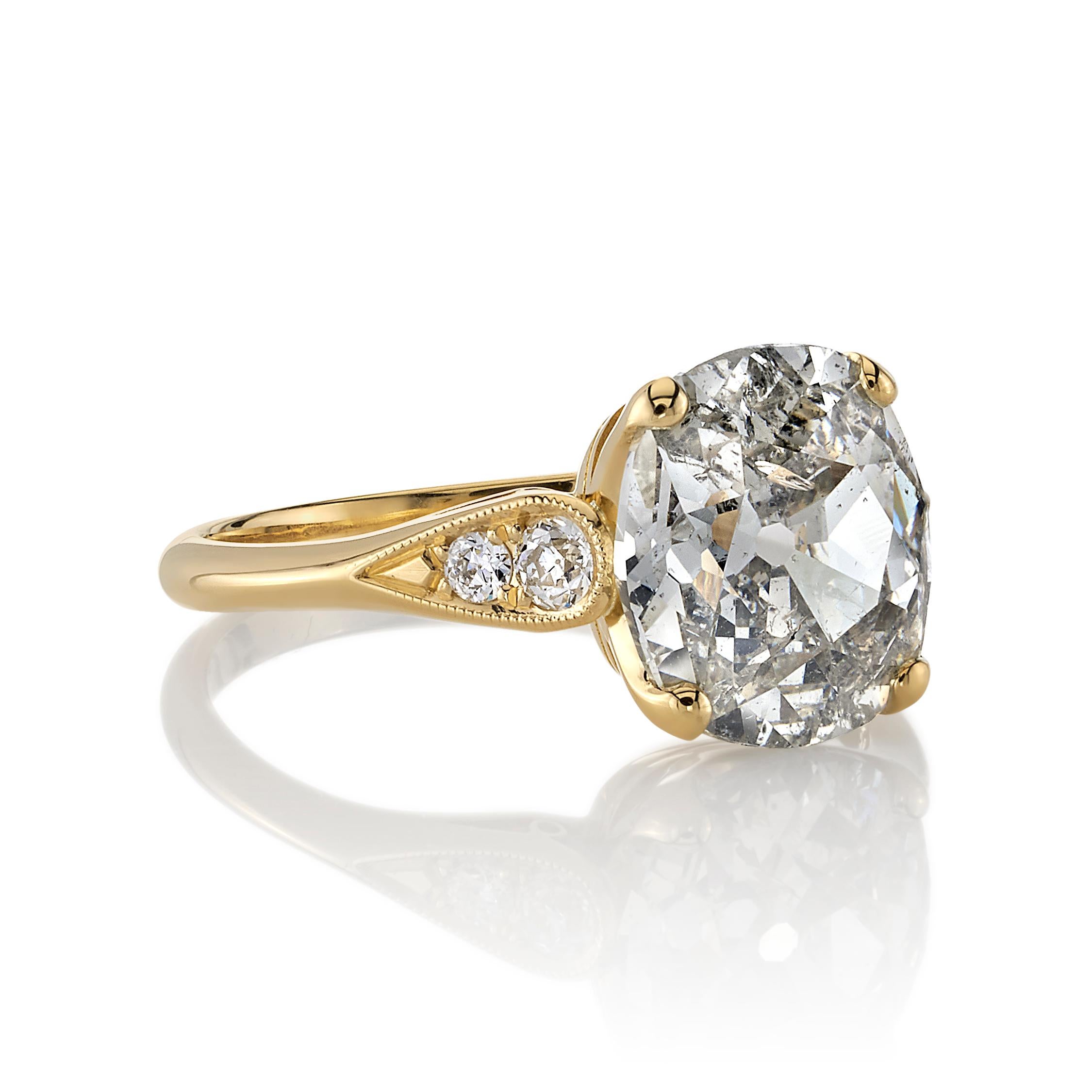 3.03ctw J/I2 GIA certified Cushion cut diamond with 0.15ctw old European cut accent diamonds set in a handcrafted 18K yellow gold mounting.

Ring is currently a size 6, and can be sized to fit.