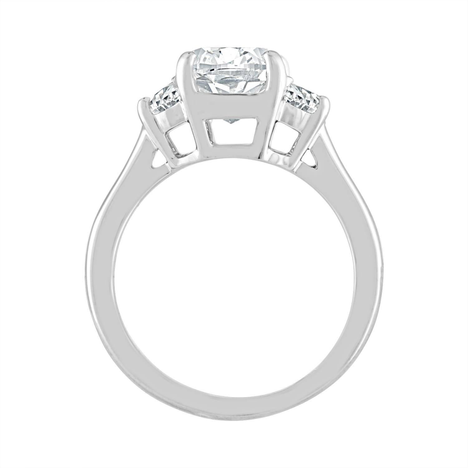3.03 Carat Cushion, GIA Certified, Set in Three-Stone Platinum Ring In New Condition In New York, NY