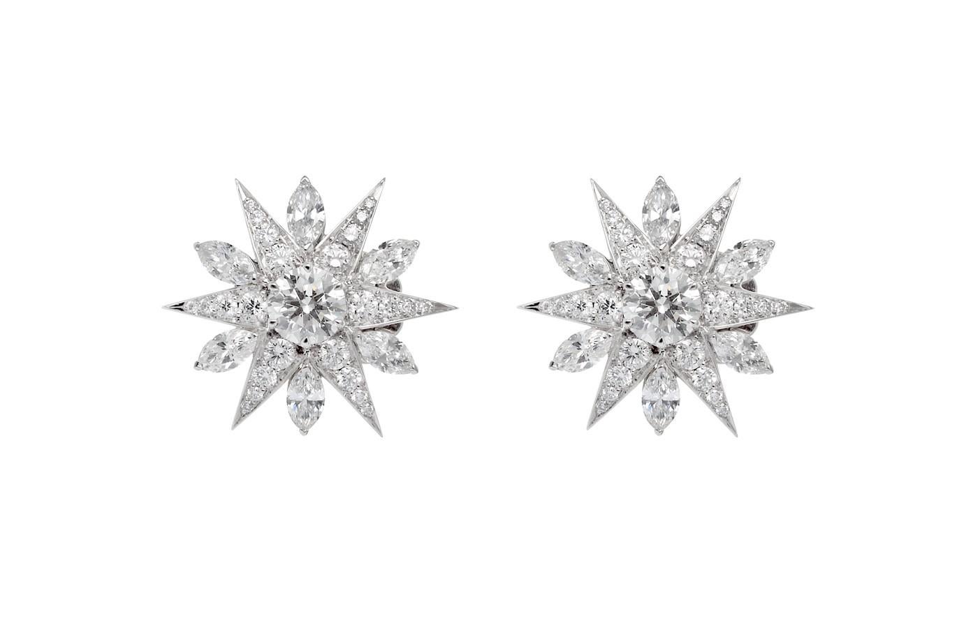 Designed for classic Hollywood glamour, the radiant white diamonds simply speak for themselves. Set in 18K white gold, nearly 2 carats of multishaped diamonds surround the 0.5 carat centre stones make up a spectacular cluster of brilliance.