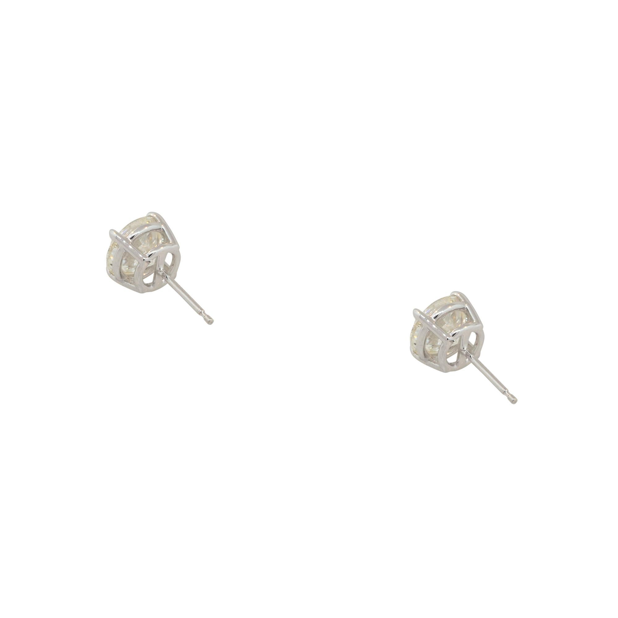 Round Cut Natural 3.03 Carat Diamond 14 Karat Stud Earrings In Stock For Sale