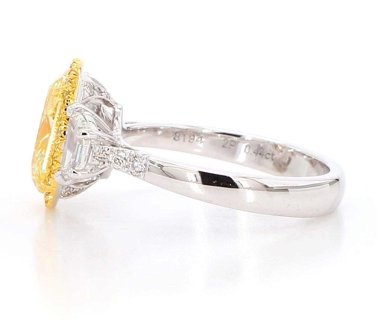 Oval Cut 3.03 Carat Fancy Light Yellow SI1 Oval [GIA #1488278194] Oval 3 Stone Ring 18K
