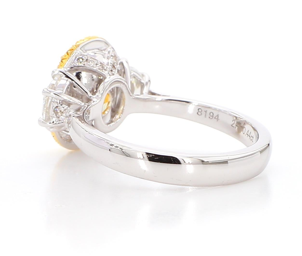 3.03 Carat Fancy Light Yellow SI1 Oval [GIA #1488278194] Oval 3 Stone Ring 18K In New Condition In New York, NY