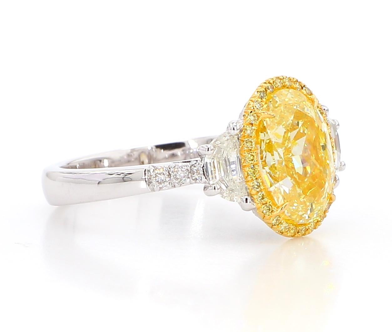 3.03 Carat Fancy Light Yellow SI1 Oval [GIA #1488278194] Oval 3 Stone Ring 18K 3