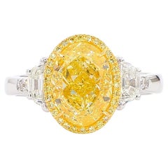 3.03 Carat Fancy Light Yellow SI1 Oval [GIA #1488278194] Oval 3 Stone Ring 18K
