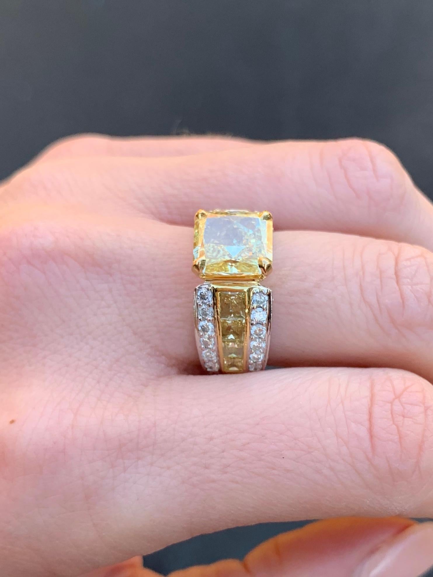 Women's 3.03 Carat Fancy Yellow Radiant Diamond JB Star Platinum and 18 Karat Gold Ring For Sale