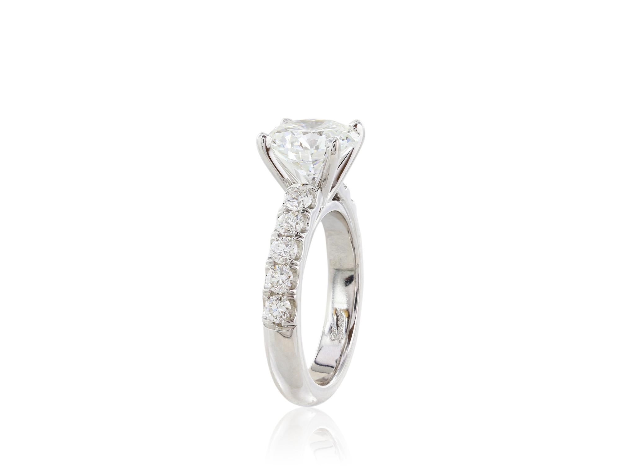 18 karat white gold solitaire diamond engagement ring  Consisting of one round brilliant Diamond 3.03 GIA #1182604109 with a color and clarity grade of E SI2