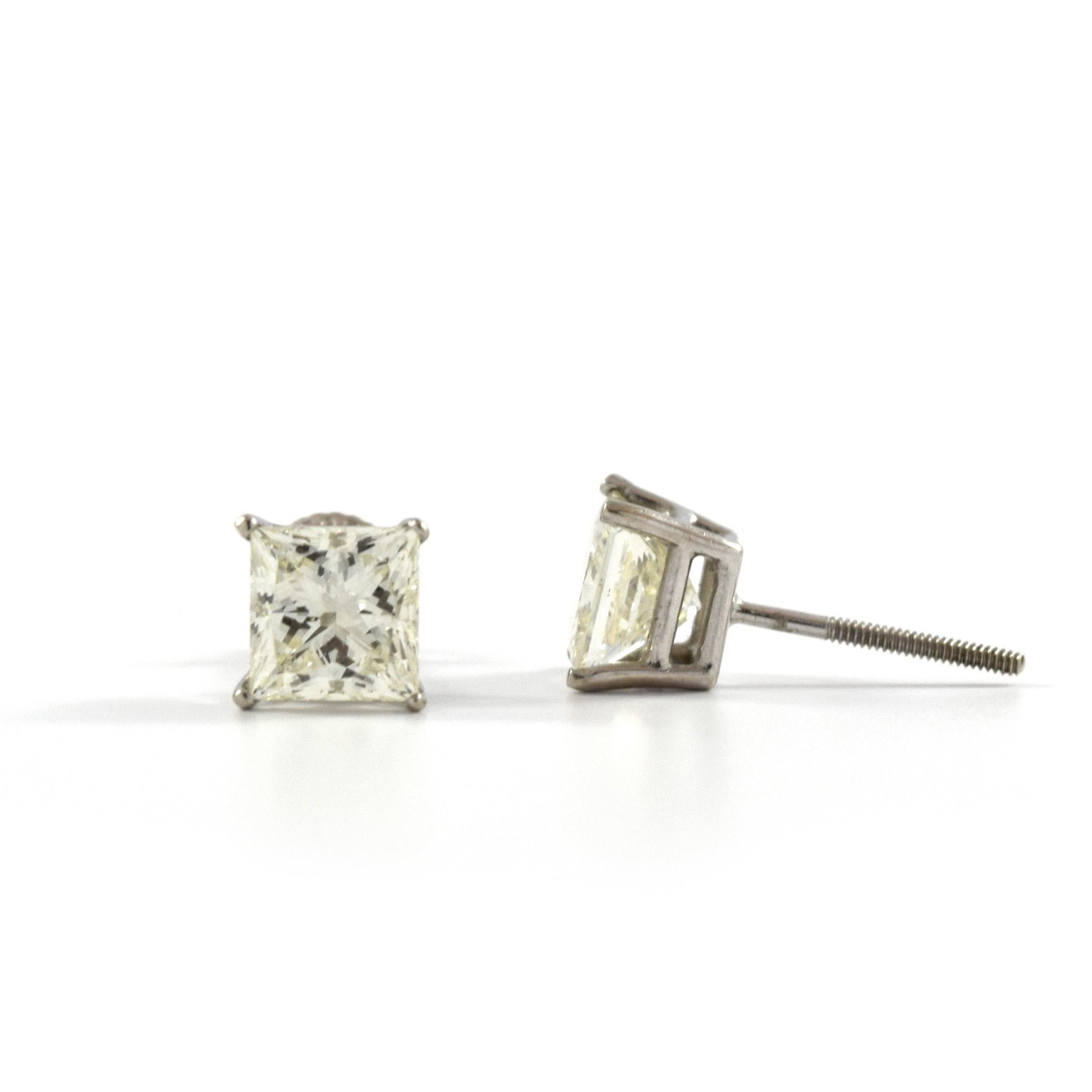 Contemporary 3.03 Carat Princess Cut White Diamonds Studs For Sale