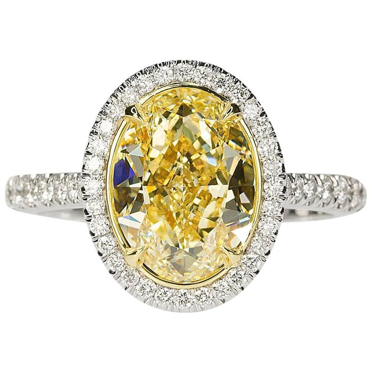 3.01 Oval Carat Canary Diamond in 18 Karat White Gold Ring For Sale at