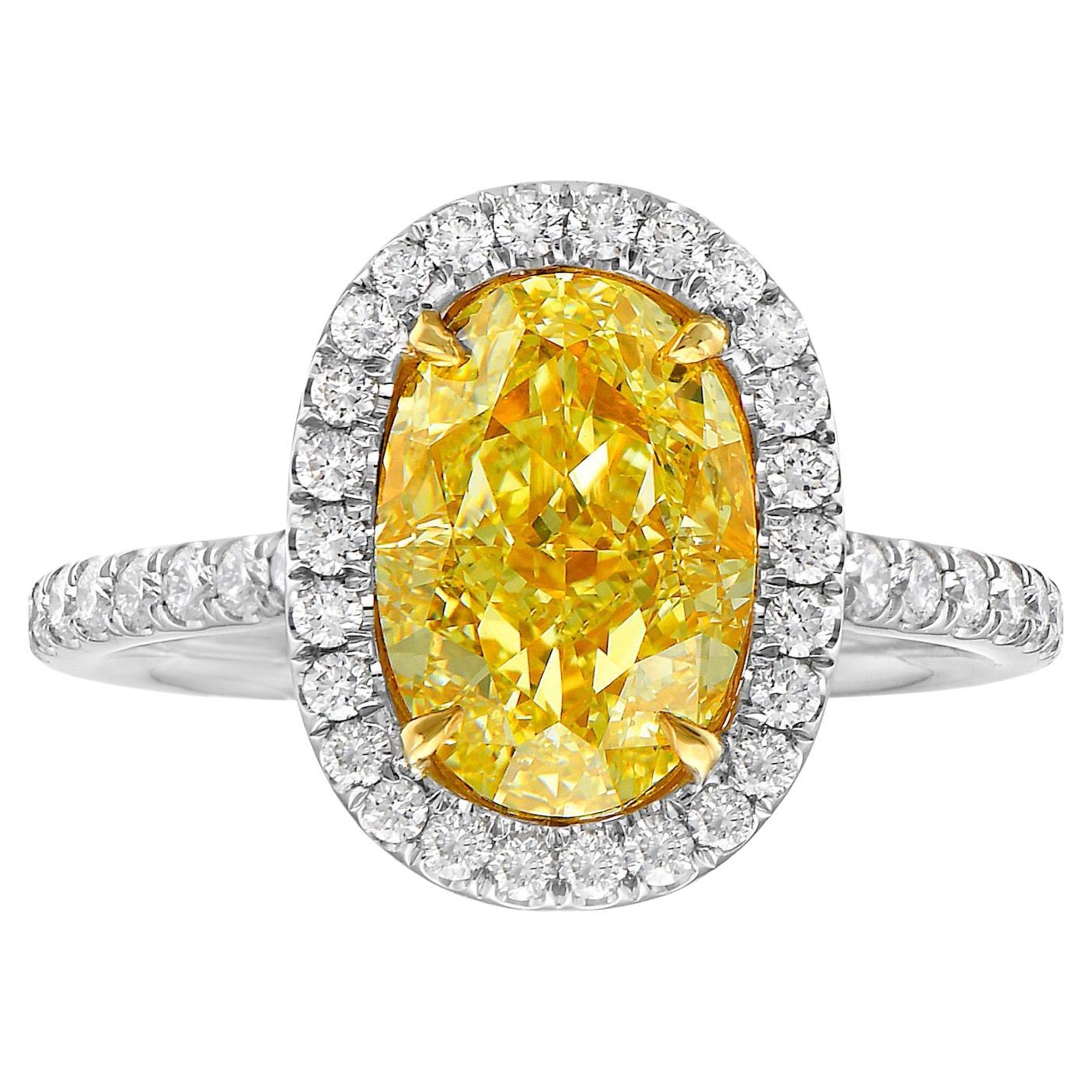 3 Carat Fancy Yellow Oval Diamond Halo Ring For Sale