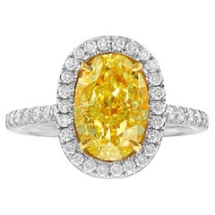 3 Carat Fancy Yellow Oval Diamond Halo Ring