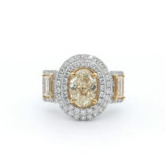 3.03ctt Oval Fancy Intense Yellow Diamond Three Stone Halo Ring 18k