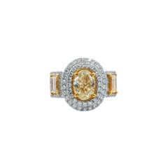 3(03)ctt Oval Fancy Intense Yellow Diamond Three Stone Halo Ring 18k (bague de halo à trois pierres)