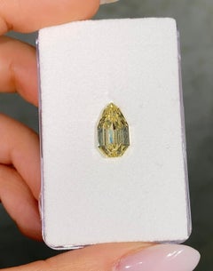 3.04 Carat Fancy Yellow Pear Step Cut Diamond